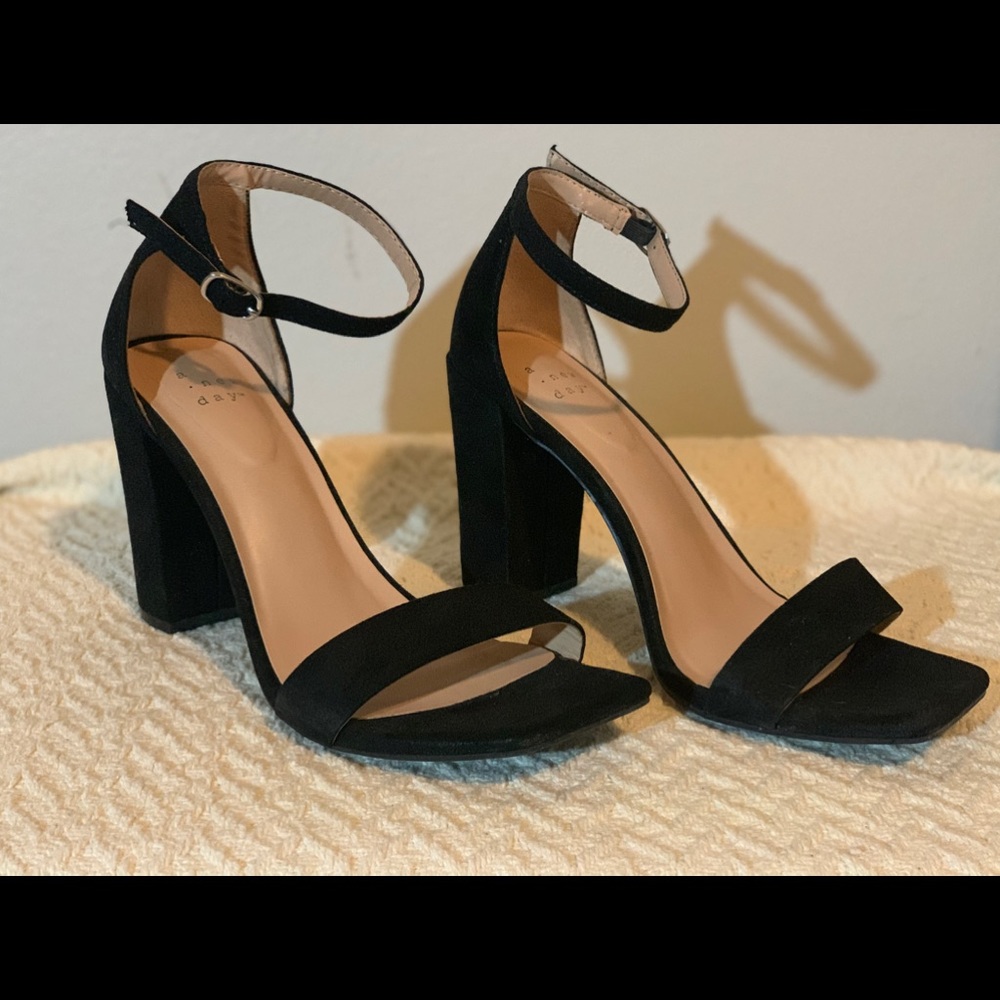 Gently used black heels